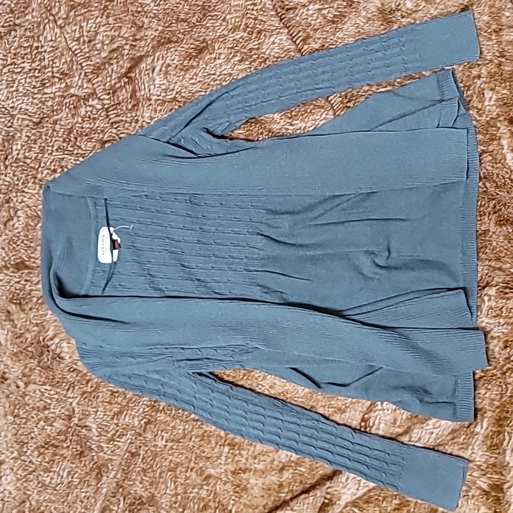 Darker green cardigan